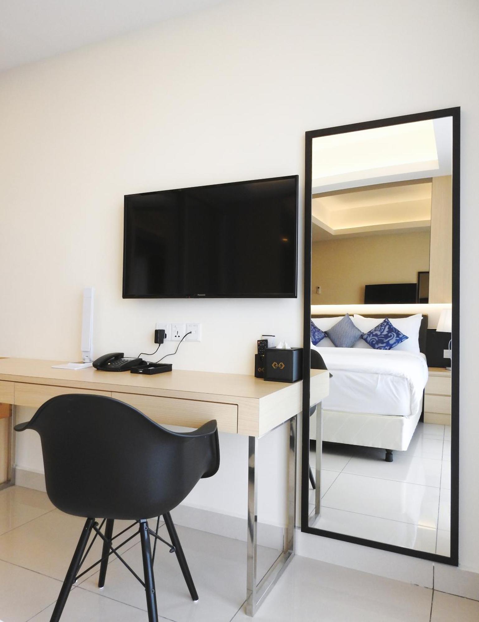 Grand Ion Delemen Hotel Τζεντίνγκ Χάιλαντς Εξωτερικό φωτογραφία A television in a hotel room